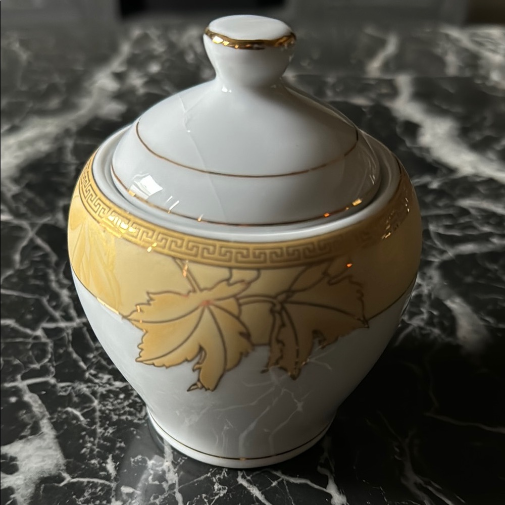 White and Gold Ceramic Food Storage Vessel